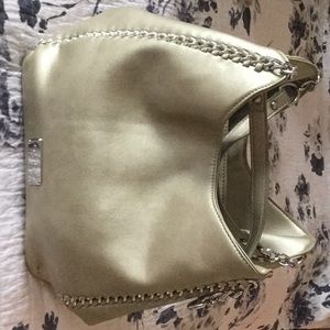 BEBE gold bag with chrome chains down the side